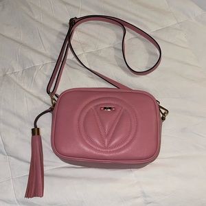 Mia Logo Embossed Leather
Crossbody Bag